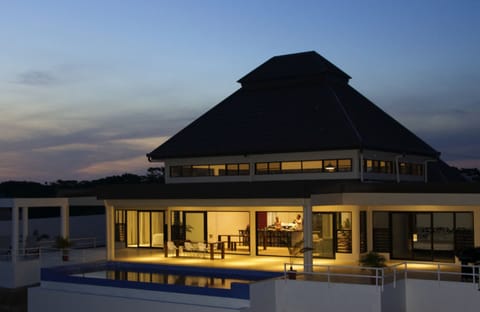 Infinity pool and outdoor space at sunset