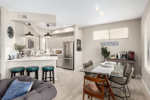 Fully Equipped Kitchen with Stainless Steel appliances and quarts countertops!