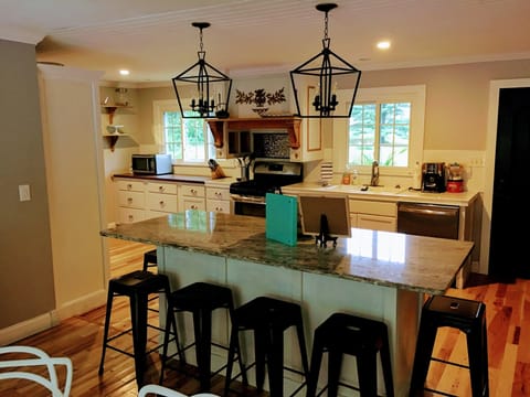 Large kitchen island with 6 bar stools
