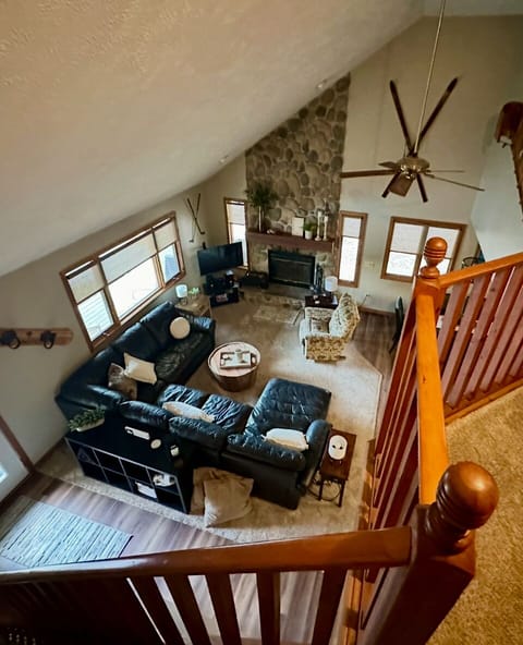  Beautiful open area w/wood burning fieldstone fireplace for cozy gatherings.