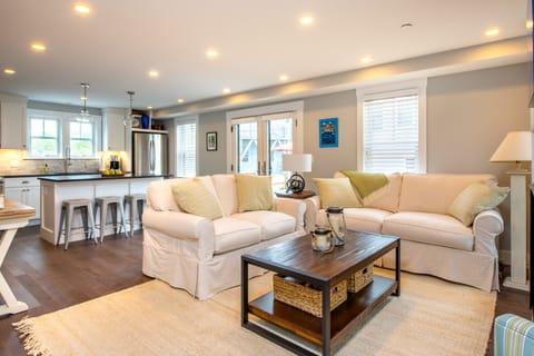 Comfy down seating in open living space invite you to nestle in with a good book