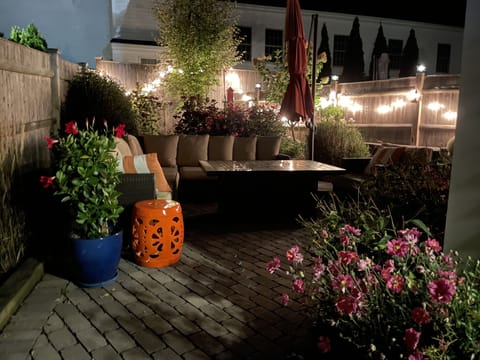 Sizable private access patio & garden for dining and lounging.