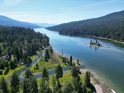 Drone views of Swan lake. Our property is located along the canal in east of the triangle island 