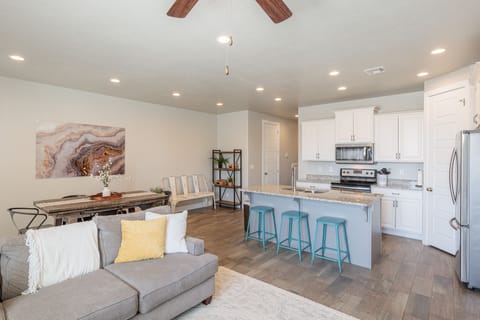 Dining Table View - From the dining table you can enjoy spending time together while also utilizing the living room or watching your favorite sports team.