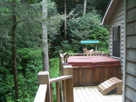 Enjoy the Hot Tub anytime during your stay right aside the rushing stream
