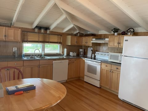 Kitchen with stove, microwave, dishwasher, etc...