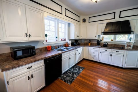 Kitchen with double oven and ample counter space.