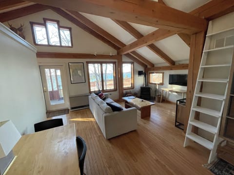 Living room with dining table against wall