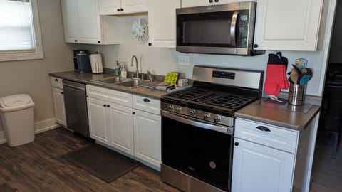 Kitchen with stainless steel appliances. 