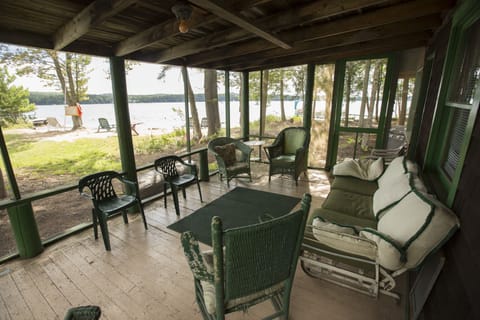 Lake House screened porch -- steps from Fourth Lake.
