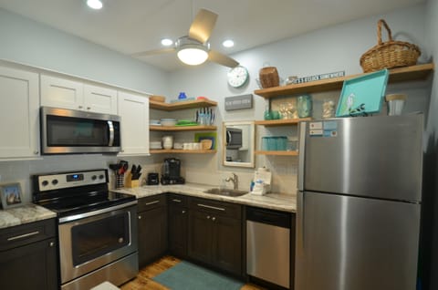 Kitchen with all essentials - pots, pans, dishes, utensils, bake ware...