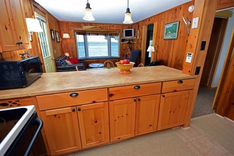 Kitchen overlooks Living Room with Water View