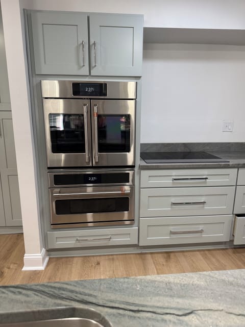 State of the art Cafe French Door oven, Advantium Oven and Induction Cooktop.