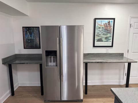 More counter space along with new Kitchen Aide Side by Side Refrigerator.