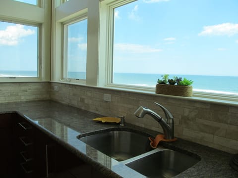Wash your dishes or chop while listening the sounds of ocean waves