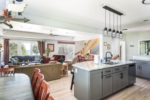 Great room.  Seating area, Dining areas and Kitchen Island