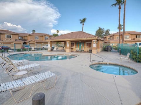 Gated Pool with heated pool, hot tub and convenient washroom.