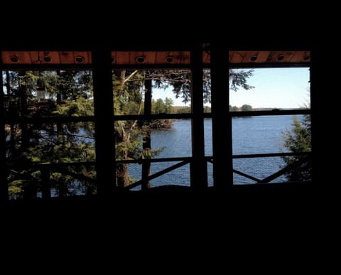 .dining room windows look on to the lake