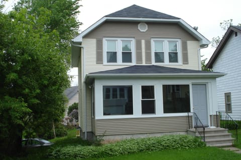 Front of the house with brand new siding.