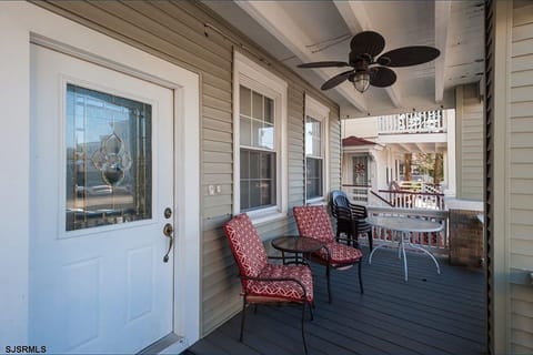 Porch with table and chairs 