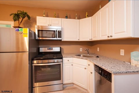 Kitchen with gas stove & oven, dishwasher 