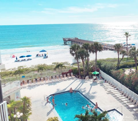 Balcony view of the pool deck and the beautiful sandy beach. 
