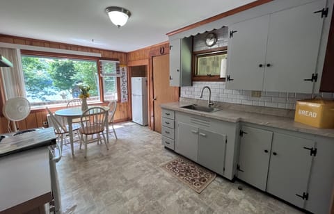 Our rustic eat-in Kitchen to enjoy meals and fun!