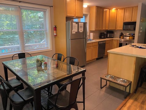 Open concept living/dining room with kitchen