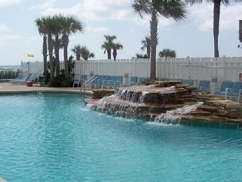 Outdoor pool with waterfall