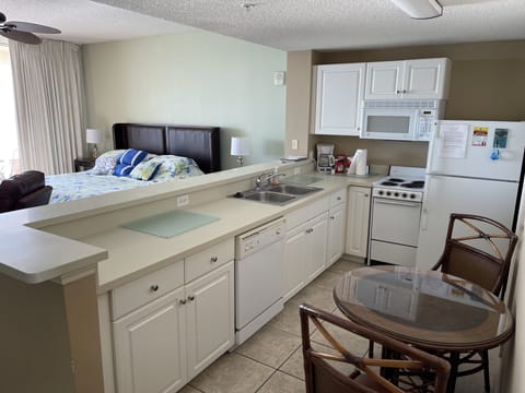 Kitchen area.Ccook, bake, and clean up with a dishwasher. Washer/Dryer in closet