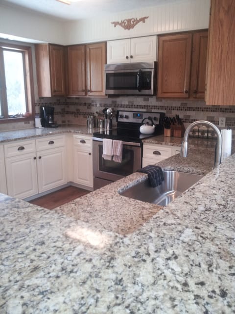 Don'tcha' love the granite??!!  Bright and great for entertaining.  