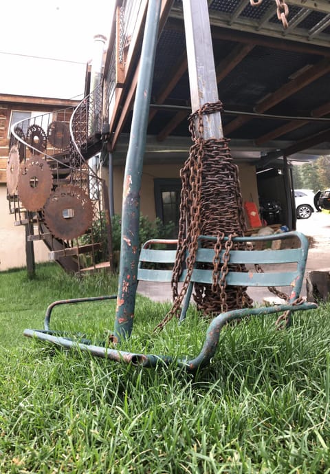 One of the first chair lifts at Brighton Ski resort adorns the yard now!