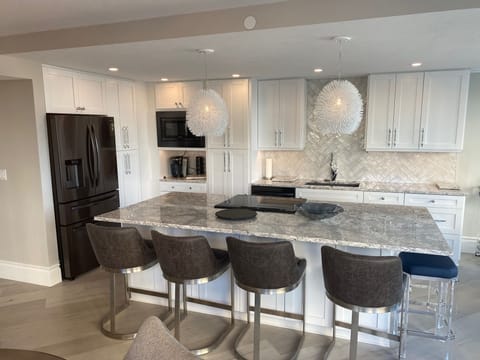 All new black stainless steel appliances