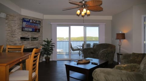 Living room.  There is a large wall mounted television.  Main Channel View!