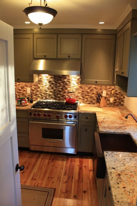 Kitchen with copper sink and Wolf range