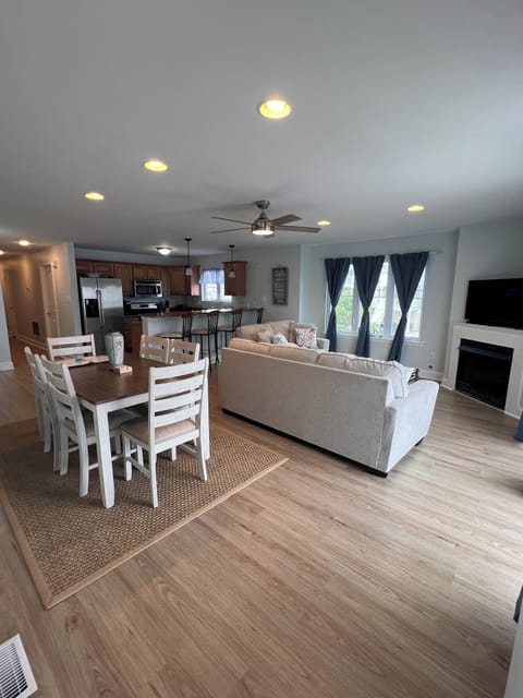 Living area with Seating for 6 at table and 4 counter stools