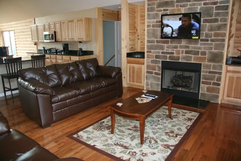 Living Room Area with fireplace and flat screen tv