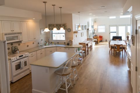 Open floor plan includes spacious areas for cooking, relaxing and game nights.