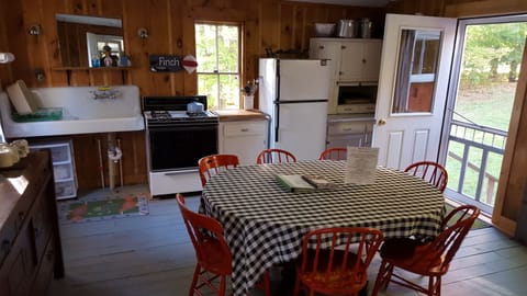 The large country kitchen comfortably seats 8, with room for more on the porch.