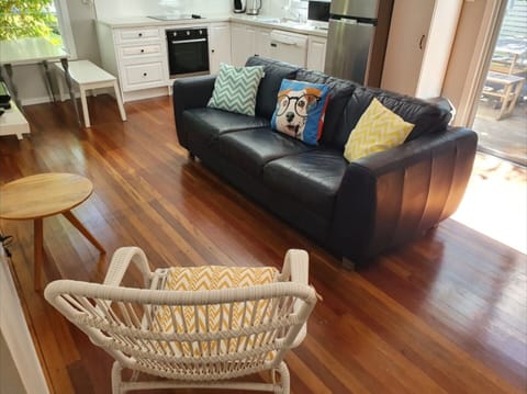 Combined kitchen, living studio space. Air conditioning, TV. Opens to deck.