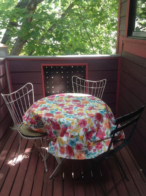 The upstairs deck has a tree-house feel.