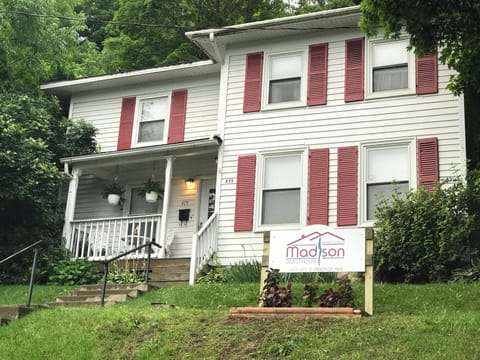A view of the front of the Madison Guest House & the steps to the front porch