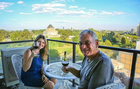 My father and wife enjoying the balcony
