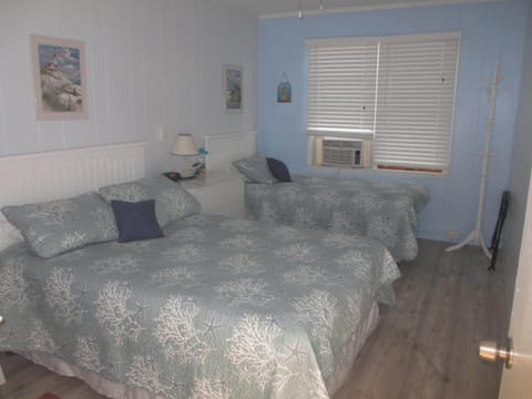 A/C units in each room or keep one window open to hear the ocean waves.