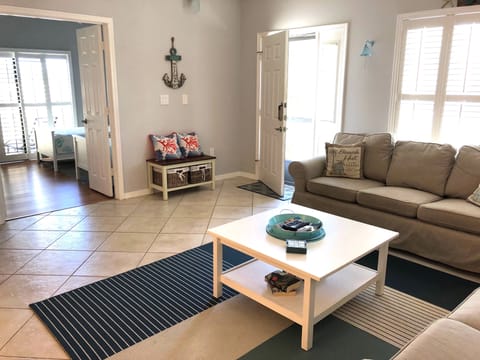 Living area, front door, and a peek into the twins room!