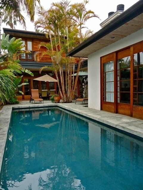 .Swimming pool with comfortable patio area, leading to the Family room.