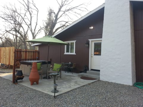 Riverside's private patio, hot tub and chimnea.