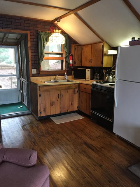 Fully Stocked Kitchen With Refrigerator, Range And Microwave