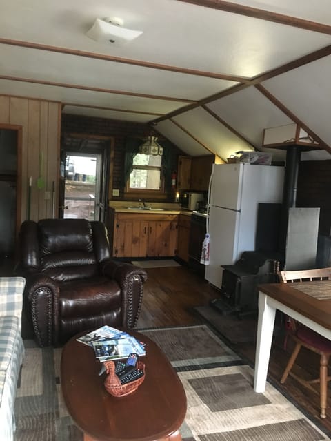 Living Room, Kitchen And Screened in Front Porch