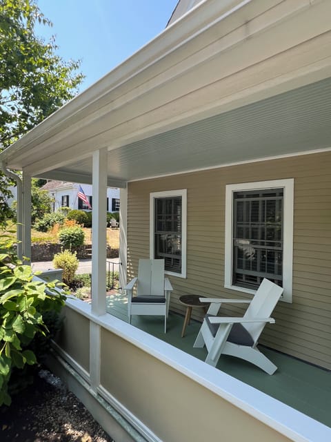 Spacious porch. with two Adirondack chairs / private entrance .